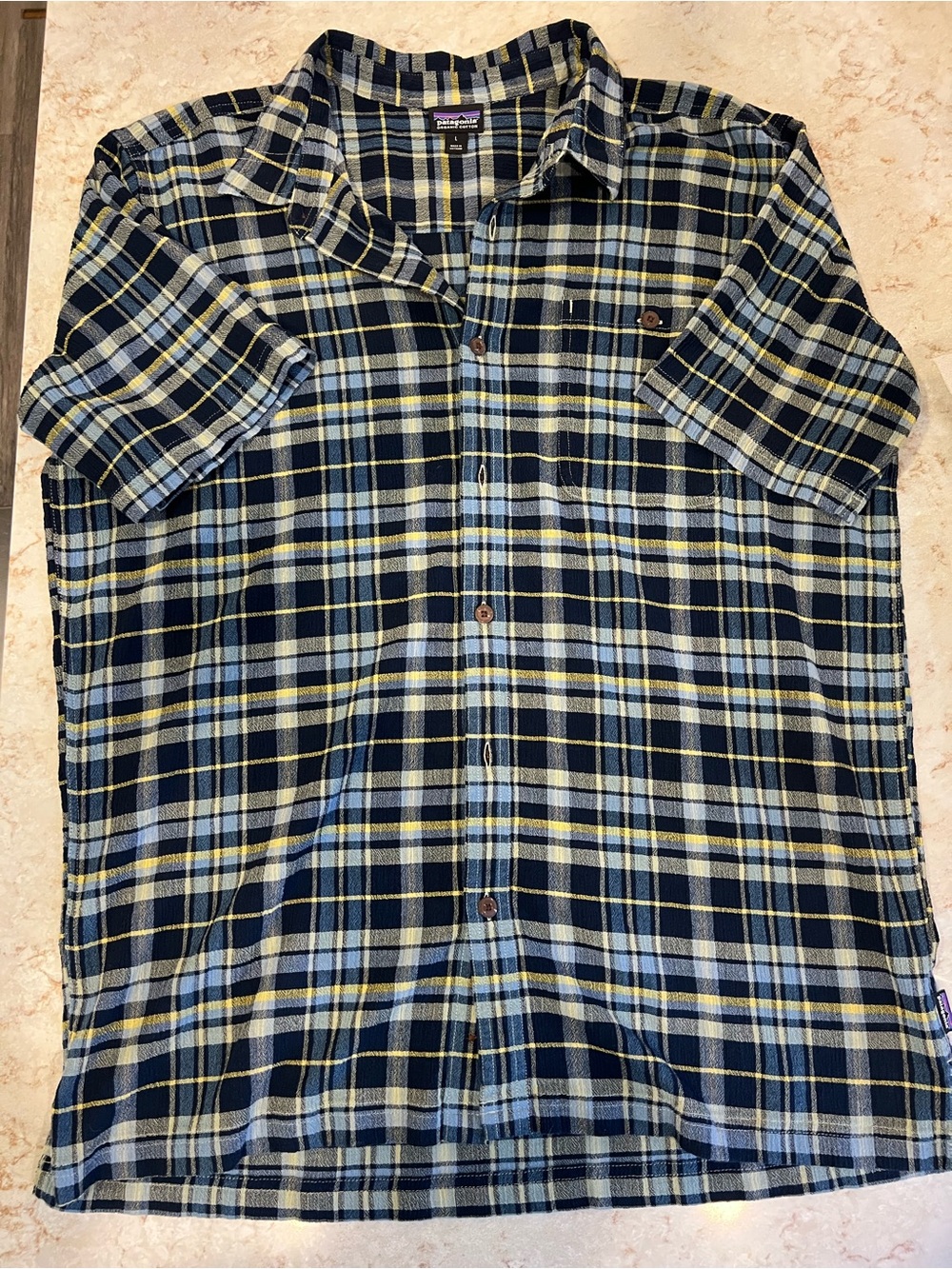 Patagonia Short-Sleeve Plaid Button-Up in Navy, Light Blue, and Yellow